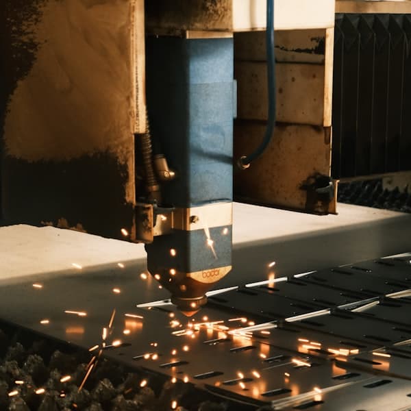 A CNC machining centre cutting metal stock